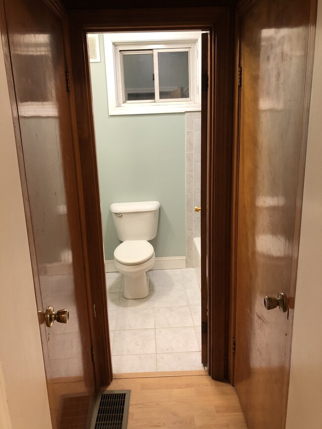 Looking into bathroom from dining room - 98 McKinley St