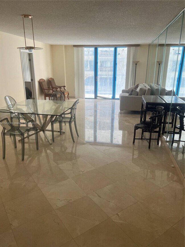 Building Photo - 9801 Collins Ave