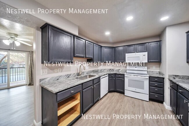 Building Photo - Updated  Mid-Level  3-bed Condo in Eagle M...