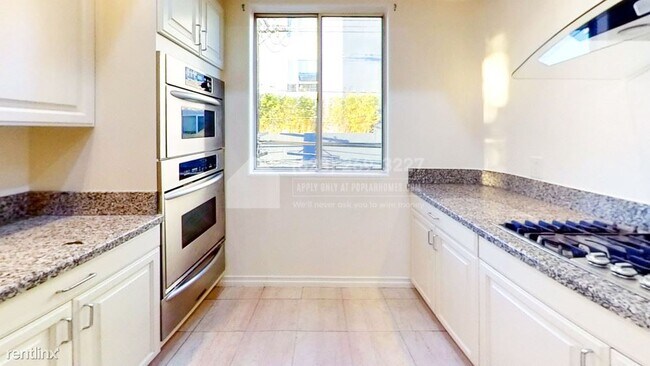 Foto del edificio - 2 br, 2 bath Condo - 8559 Alcott ST APT 305 -