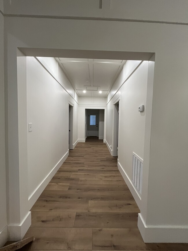 Hallway from front door - 112 W Oldham Ave