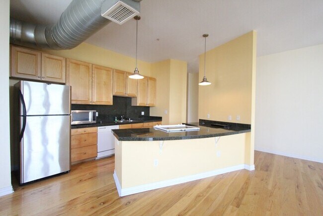 Building Photo - Spacious Penthouse Loft Garage Parking Included in Price!  - 3rd and Broadway in the Heart of Den...