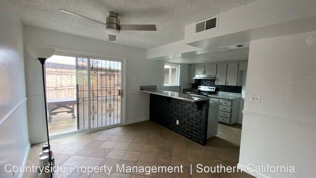 Building Photo - 3 br, 1.5 bath House - 5188 E. Ashlan Aven...
