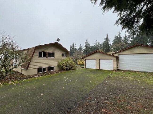 Building Photo - Beautiful Multi-Level Home with Vaulted Ceilings & Stunning Wood Accents