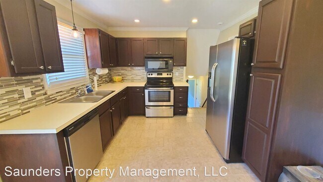 Building Photo - 3 br, 2.5 bath House - 7008 Harperglen Rd