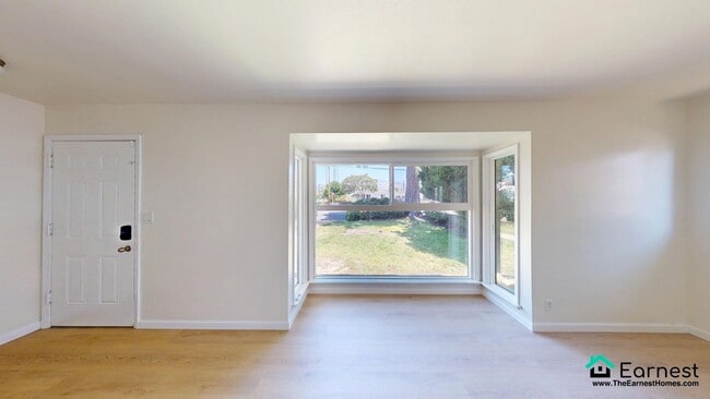 Building Photo - 3 + 3 Spacious Home in a Peaceful Neighbor...