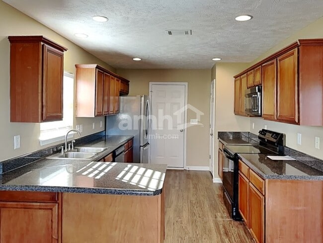 Building Photo - 4005 Strata Dr