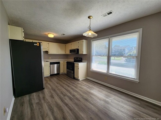 Building Photo - 2908 Rosemeade Dr