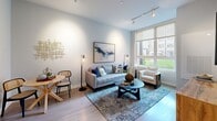 Located at 3401 W Payton Pl in Arlington Heights, IL, this thoughtfully designed one-bedroom, one-bathroom residence offers a modern and functional living experience across a well-utilized single floor. The open-concept kitchen and living area serves as the heart of the home, featuring a sleek kitchen with two-tone cabinetry — white upper cabinets paired with gray lower cabinets — stainless steel appliances, a tile backsplash, and a generous white quartz peninsula with bar seating for four. Pendant and recessed lighting illuminate the space with a warm, contemporary glow. The living room flows naturally from the kitchen, highlighted by light hardwood-style flooring, elevated ceilings, and a teal accent wall that anchors the TV area with a bold design statement. A dedicated office provides a quiet and functional workspace. The spacious primary bedroom offers a comfortable retreat with soft neutral tones and ample room. The walk-in closet includes wire shelving and a full hanging rod for organized storage. The bathroom is finished with gray cabinetry, a white quartz countertop, a large mirror, and a clean walk-in shower with white tile surround. Throughout, the residence maintains a cohesive modern aesthetic with light tones and quality finishes.
