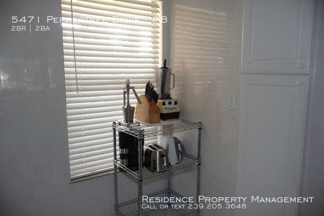 Foto del edificio - 5471 Peppertree Dr