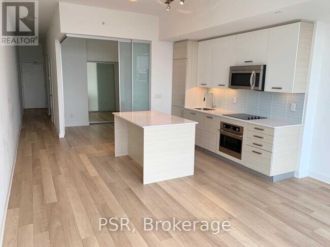 Photo du bâtiment - 210-1210 Simcoe St