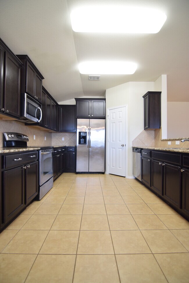 Foto del edificio - 4903 Green Meadow St