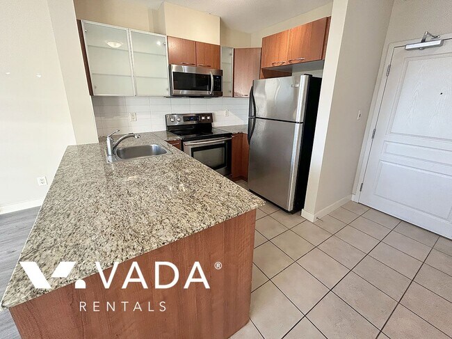 Photo du bâtiment - King Edward Village 1 BR APT Rental 553-1483 East King Edward Ave Vancouver: VADA