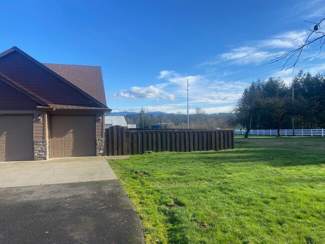 Building Photo - Beautiful Custom Home Acreage Property