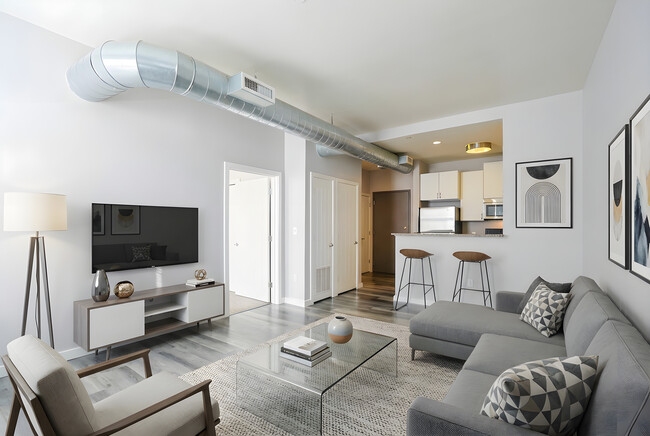 1BR, 1BA - 642SF - Living Room & Kitchen - The Box District