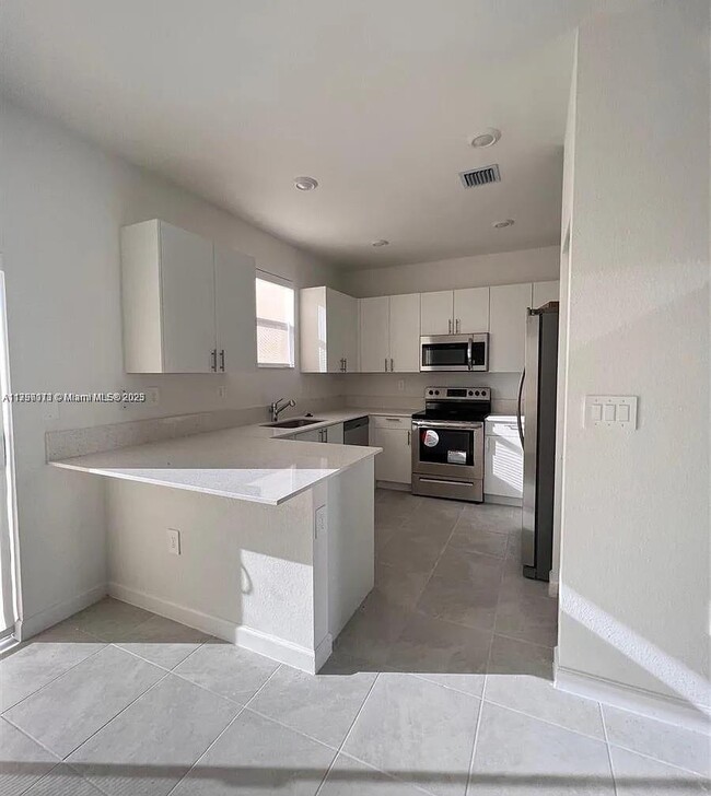 Building Photo - 24700 SW 119th Pl
