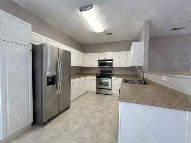 Building Photo - Charming Single-Story Home with Open Floor...