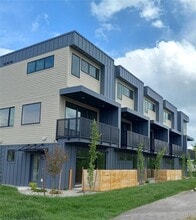 2nd level South facing covered patio on walking trail - Westland Lofts