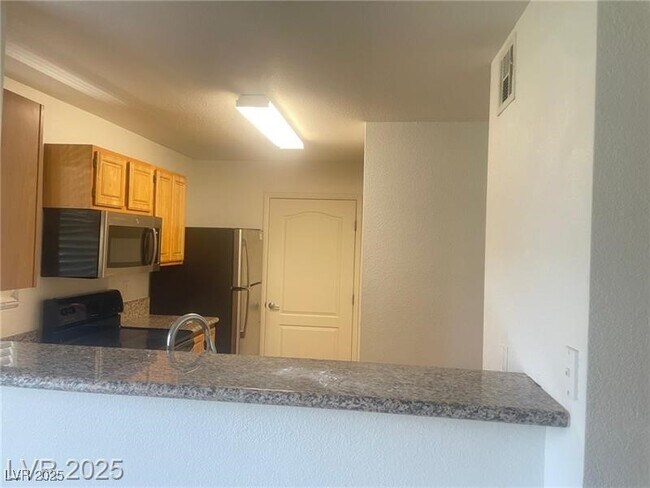 Foto del edificio - 5055 W Hacienda Ave