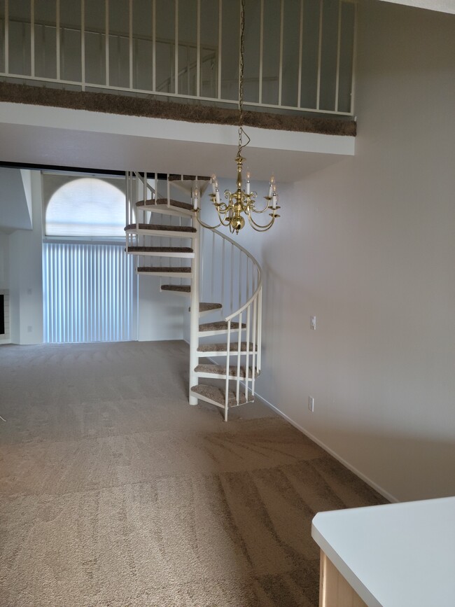 Dining Area, Spiral Staircase & Living Room (as viewed from kitchen) - 18121 Erik Ct