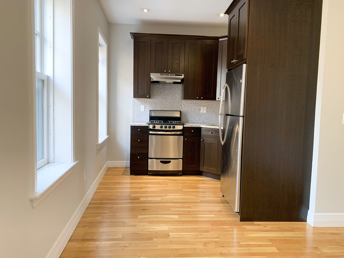 View into Kitchen from Living Area - 33 Anderson St