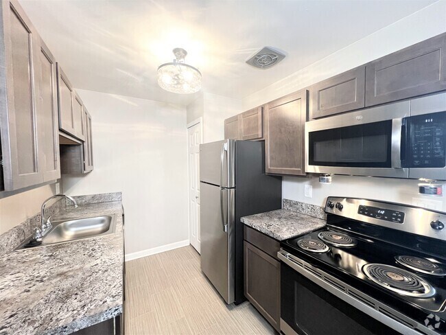 1 Bedroom Renovated Kitchen - Williamsburg Square Apartments