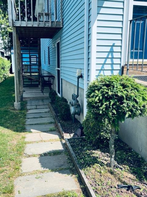 porch and entrance to apartment - 57 Dana St