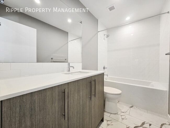 Building Photo - BRAND NEW 2 BEDS, 2 BATHS CONDO | PRIME BELTLINE LOCATION | CENTRAL A/C
