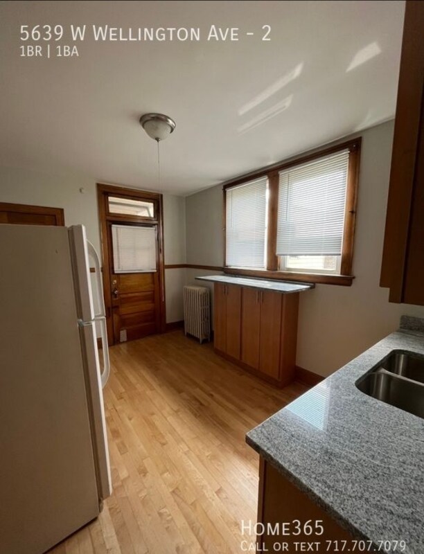 Foto del edificio - 5639 W Wellington Ave