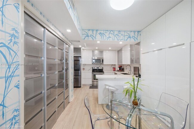 Building Photo - 9801 Collins Ave