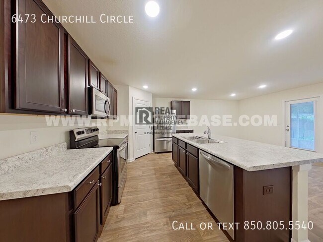 Foto del edificio - 6473 Churchill Cir