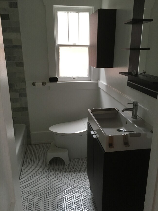 The bathroom, including smart toilet w/bidet. - 945 Washington St