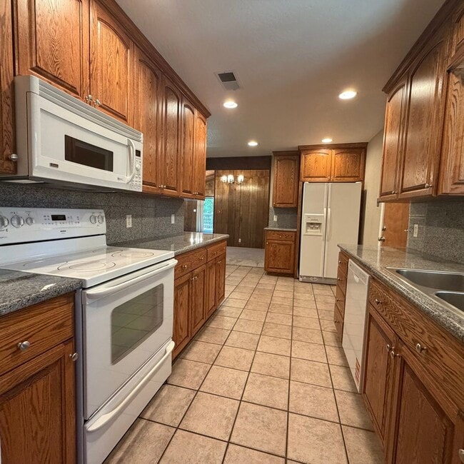 Building Photo - Adorable house with large deck,  yard and RV access