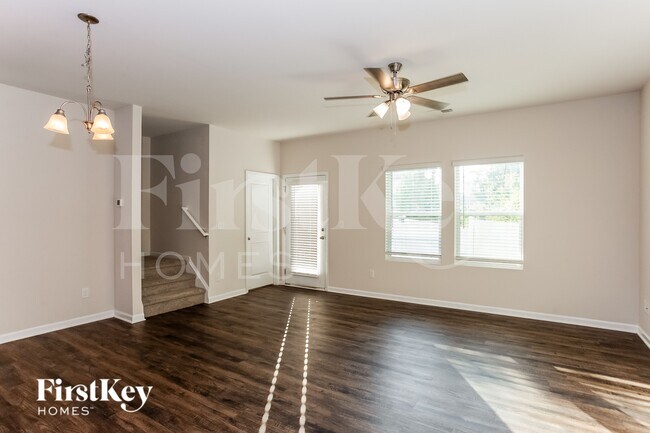 Foto del edificio - 10755 Rivergate Dr NW