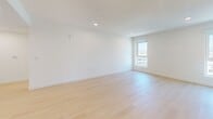 Located at 510 South Oxford Avenue in the heart of Los Angeles, this thoughtfully designed two-bedroom, two-bathroom residence offers a clean, modern aesthetic across a single well-organized floor. Light wood flooring flows throughout, complementing the bright white walls and recessed lighting that create an open, airy atmosphere.

The kitchen is a standout feature, outfitted with slate-blue flat-front cabinetry, white quartz countertops with a striking veined marble-look backsplash, and stainless steel appliances including a dishwasher and range. A dedicated laundry area houses a stacked washer and dryer unit alongside a wooden utility bench for added convenience.

The generously sized primary bedroom opens to a private balcony through sliding glass doors, offering views of palm trees and the surrounding Los Angeles skyline. Its en-suite bathroom features a wide vanity with a large mirror, a soaking tub, and accessible grab bars. The second bedroom benefits from large windows framing sweeping views of the city and the San Gabriel Mountains beyond.

A second bathroom includes a glass-enclosed walk-in shower with mosaic tile flooring and a clean, minimalist design. Two hallways connect the spaces efficiently, and the overall layout provides a functional, contemporary living environment well-suited to urban Los Angeles living.