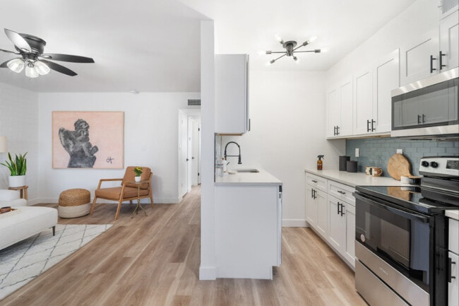 Updated, Open Kitchen Layout. - Bella Villas Apartments
