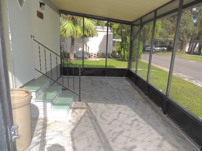 SCREENED LANAI - 7815 Sunrunner Dr