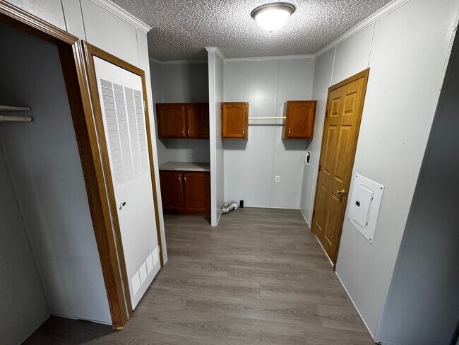 Building Photo - Very large yard great location a nice older doublewide Home