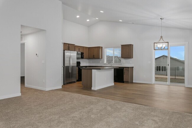 Building Photo - 4 Bedroom, 2 Bath & 3 Car Garage!
