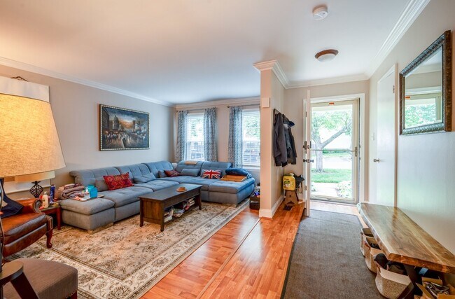 Building Photo - This end unit boasts four bedrooms and thr...