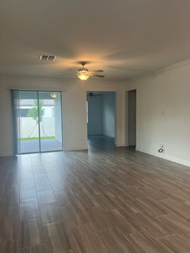 Living area and den - 9978 Campanula Ct