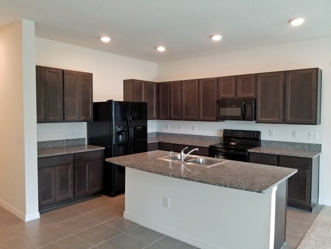 Building Photo - 6917 Breezy Palm