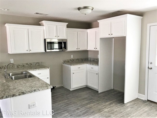 Building Photo - 9063 Whispering Pines Blvd