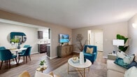 Located at 500 Lions Creek Circle in Noblesville, Indiana, this well-appointed one-bedroom, one-bathroom residence offers a thoughtfully designed single-floor layout that maximizes every square foot. The open-concept living room is a standout space, featuring wood-style flooring, a bold teal accent wall, and a sliding glass door that fills the room with natural light. The adjacent dining area benefits from multiple windows and provides a bright, welcoming setting for everyday meals. The galley-style kitchen is efficiently designed with rich dark cabinetry, white countertops, a stainless steel sink, and a full suite of stainless steel appliances including a refrigerator, range, and microwave. The bedroom offers plush carpeting, a natural light-filled window, and two side-by-side closets providing ample storage. A calming teal accent wall anchors the room and adds a cohesive design thread throughout the home. The bathroom includes a tub-shower combination with tile surround and wood-style flooring. Neutral warm tones across the walls and flooring create a cohesive and inviting ambiance throughout, making this a comfortable and functional home in a desirable Noblesville location.