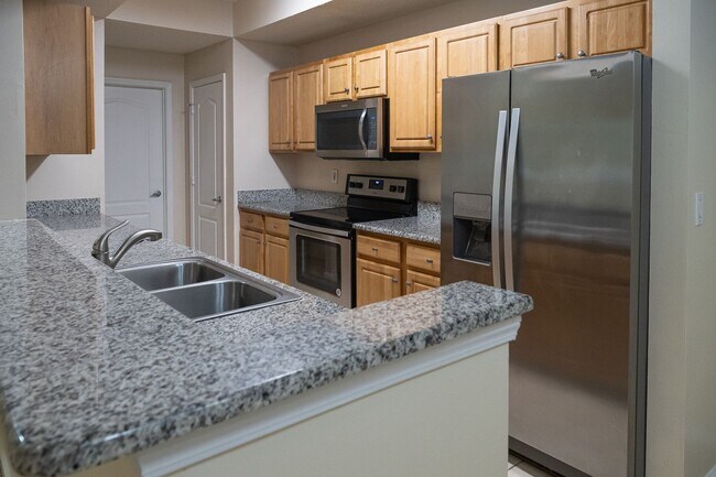 Photo - Beautiful 3 Bedroom, 2 Bath with Volume ceilings and Private Garage! Townhome