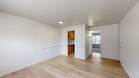 Located at 372 Beechmont Dr in Newport News, VA, this well-organized one-bedroom, one-bathroom residence makes efficient use of its single-floor layout. The living area welcomes you with clean, light-toned hardwood-style flooring that extends throughout the main living spaces, giving the unit a bright and cohesive feel. Crisp white walls and neutral tones create a clean, move-in-ready atmosphere throughout.

The kitchen is conveniently situated off the main living area and features warm honey-toned wood cabinetry paired with a functional countertop layout — compact yet practical for everyday cooking needs.

The bedroom is a comfortable, well-proportioned retreat finished with plush carpet flooring that adds warmth underfoot. A large double sliding closet provides ample storage, while a window with blinds allows natural light to filter in and offers a view of the surrounding neighborhood.

The full bathroom is finished with a clean, all-white tub and shower surround, complemented by a standard toilet and sink. A grab bar adds an accessible touch. Tile flooring completes the functional, tidy space.

Two closets throughout the unit offer additional storage options. The layout flows logically from the living area through to the bedroom and bathroom, making the space practical and easy to navigate. Central air and heating vents are present throughout, ensuring year-round comfort.