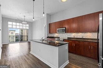 Building Photo - 711 Cosmopolitan Dr NE