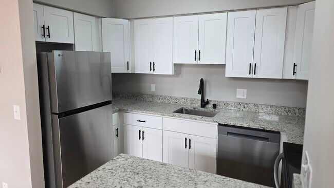 Cocina recién reformada - Homestead Court Townhomes
