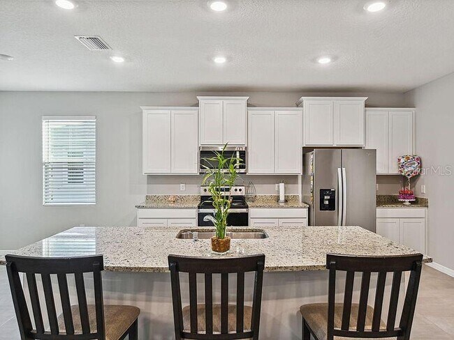 Building Photo - 10702 Laxer Cay Loop