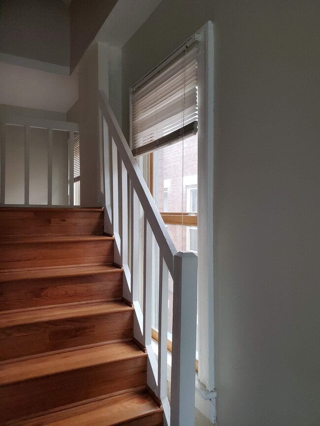 Updated stairs with hardwood - 95 W 1st Ave